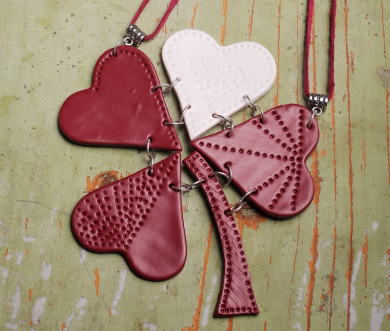 Necklace made of leather-like heart-shaped pieces