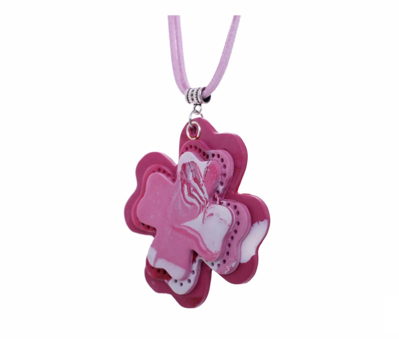 Polymer clay clover-shaped medallion